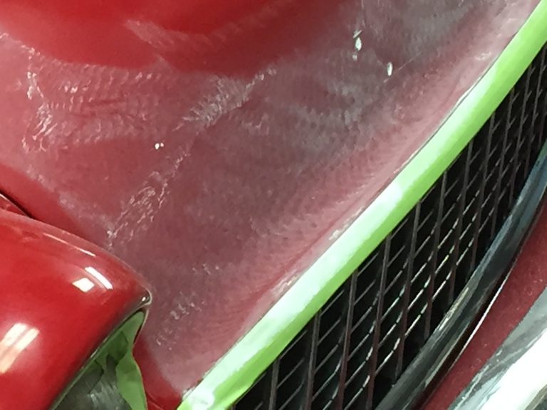 wax applied on the hood of a car